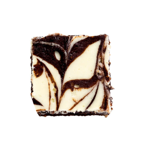 Square piece of chocolate brownie and white swirled cheesecake on a white background.